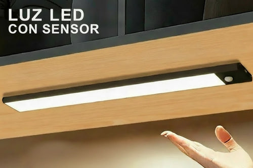 Centinela · luz discreta bajo un armario de cocina activándose al paso de una mano